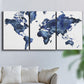 Three-panel canvas wall art featuring world map with water motif, displayed in a living room above a sofa.