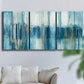 Three-panel canvas wall art featuring layered abstract earth tones, displayed in a living room above a sofa.