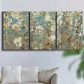 Three-panel canvas wall art featuring abstract flowering vine pattern, displayed in a living room above a sofa.