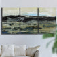 Three-panel canvas wall art featuring muted abstract landscape study, displayed in a living room above a sofa.