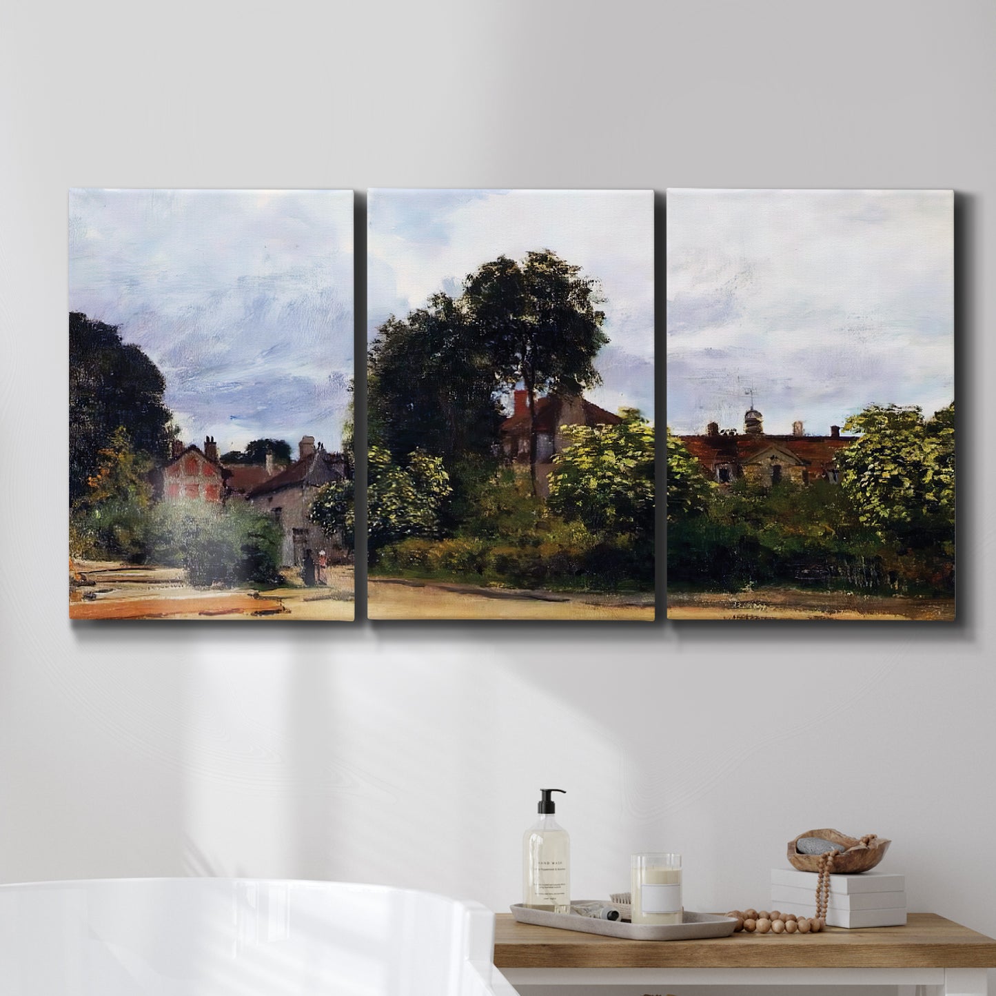 Three-panel canvas wall art featuring garden corner with flowering trees, displayed in a bathroom above a bathtub.