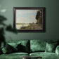 Impressionist river scene with red boats by Claude Monet in an ornate black frame with gilded inner detail displayed in a dark-toned interior setting.