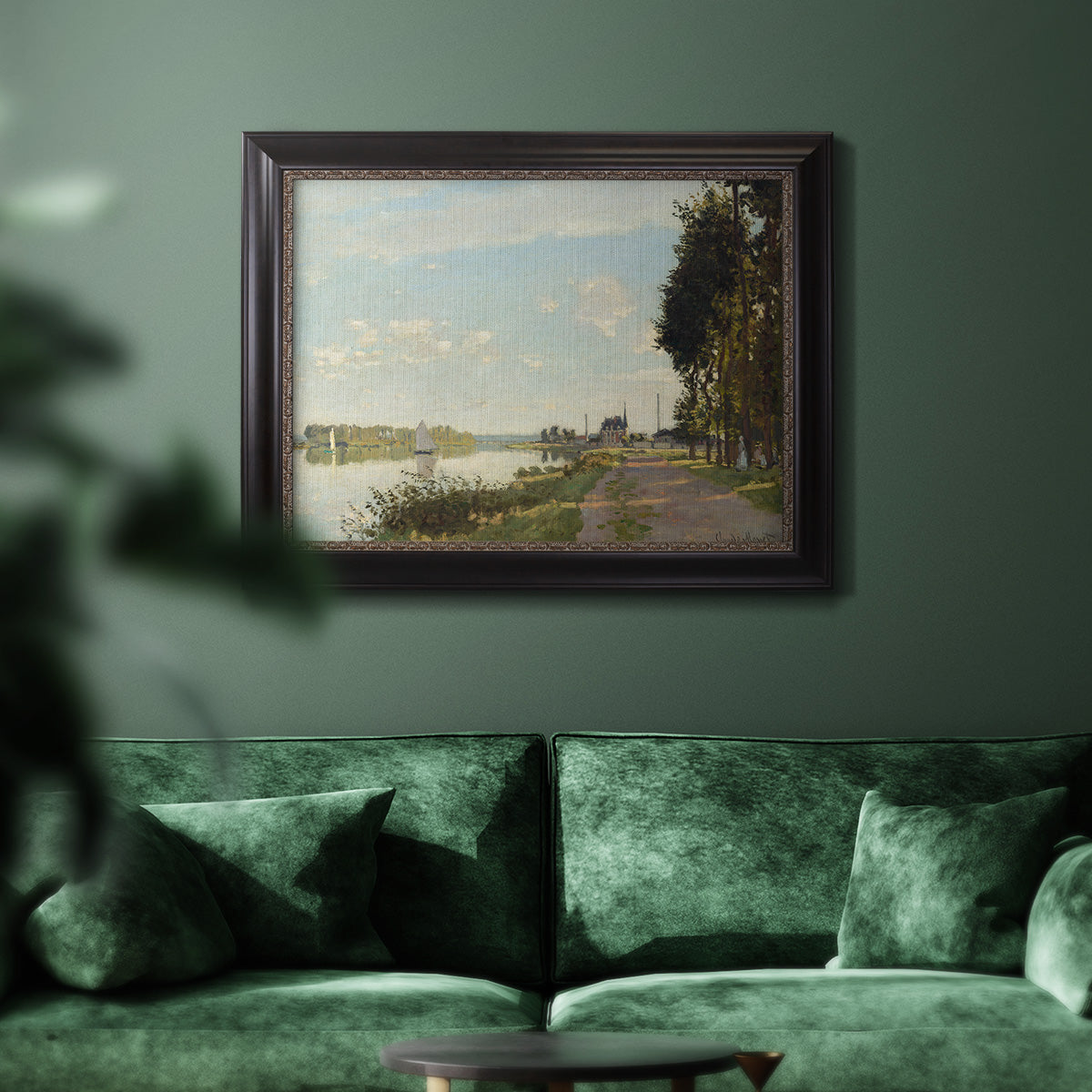 Impressionist river scene with red boats by Claude Monet in an ornate black frame with gilded inner detail displayed in a dark-toned interior setting.