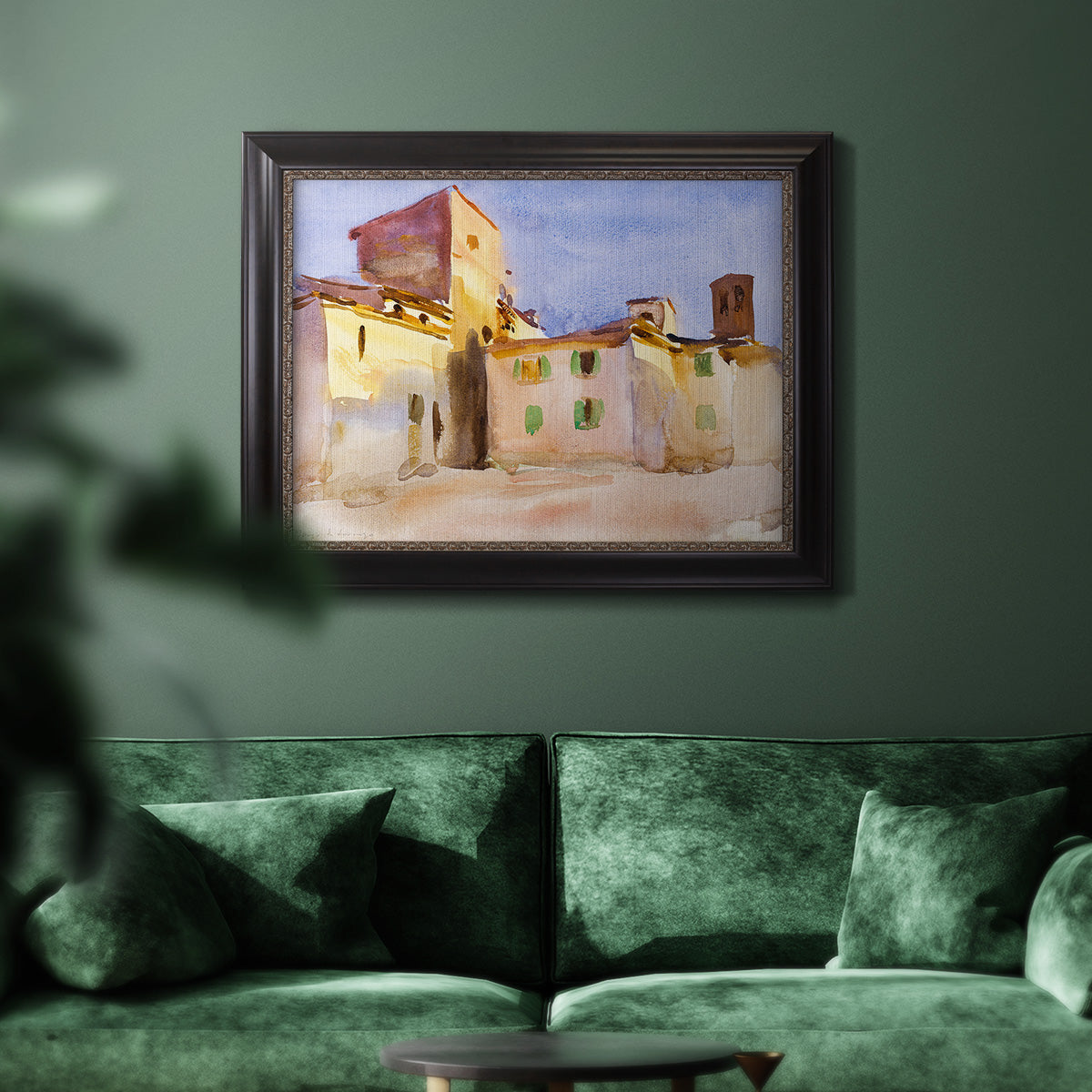 Impressionist Italian village scene by John Singer Sargent in an ornate black frame with gilded inner detail displayed in a dark-toned interior setting.