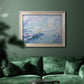 Impressionist industrial harbor scene by Paul Signac in an ornate champagne frame displayed in a dark-toned interior setting.