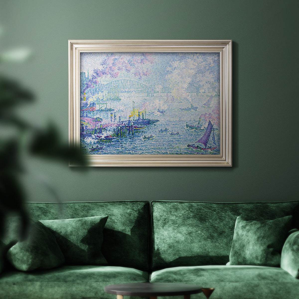 Impressionist industrial harbor scene by Paul Signac in an ornate champagne frame displayed in a dark-toned interior setting.