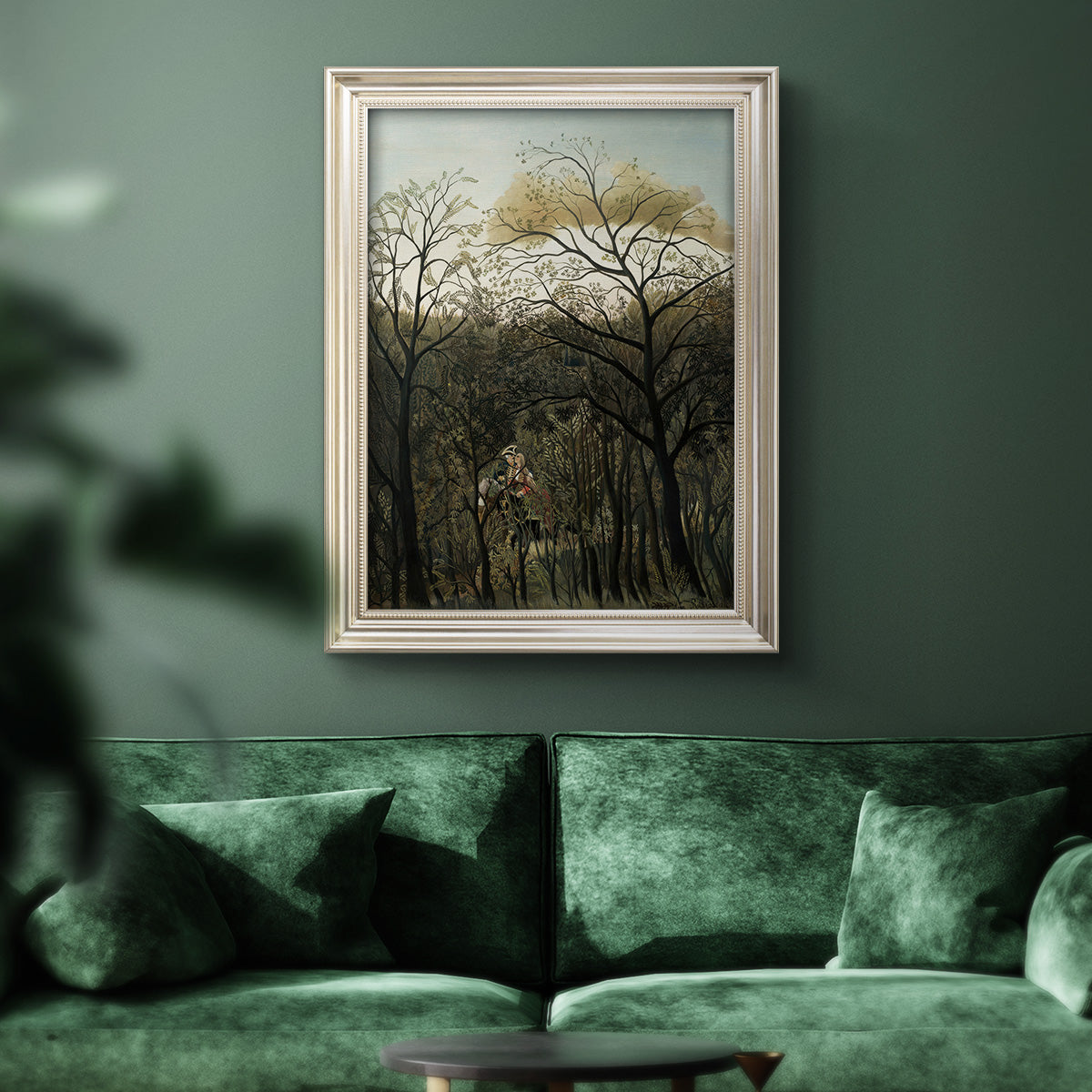 Dreamlike forest landscape scene by Henri Rousseau in an ornate champagne frame displayed in a dark-toned interior setting.