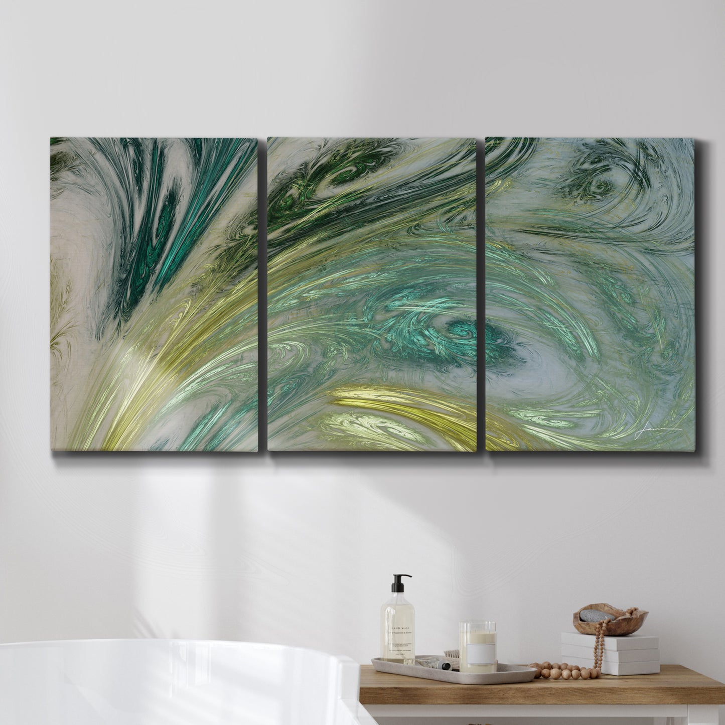 Three-panel canvas wall art featuring layered modern abstract landscape, displayed in a bathroom above a bathtub.