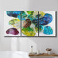 Three-panel canvas wall art featuring expressive abstract color interpretations, displayed in a bathroom above a bathtub.