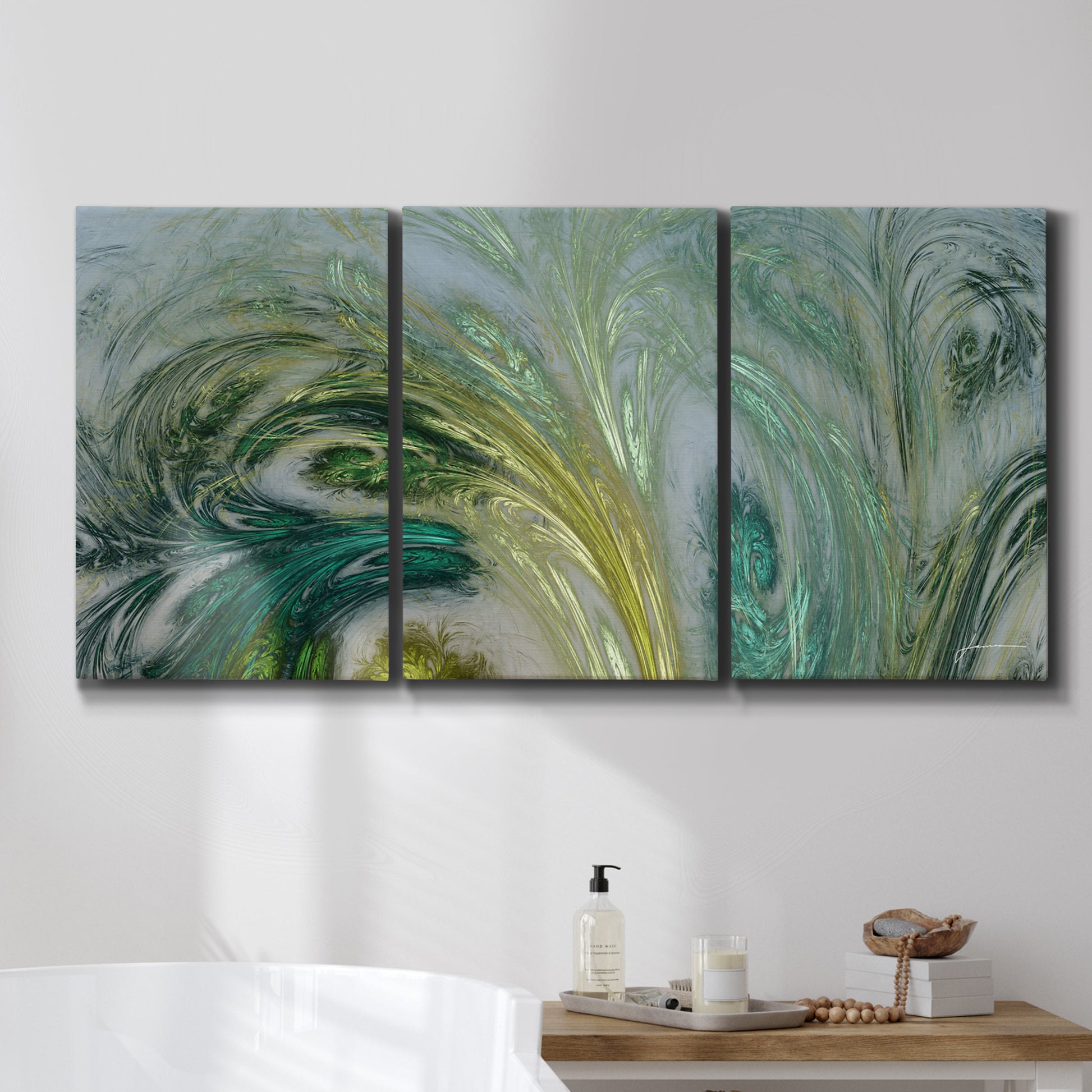 Three-panel canvas wall art featuring layered modern abstract landscape, displayed in a bathroom above a bathtub.