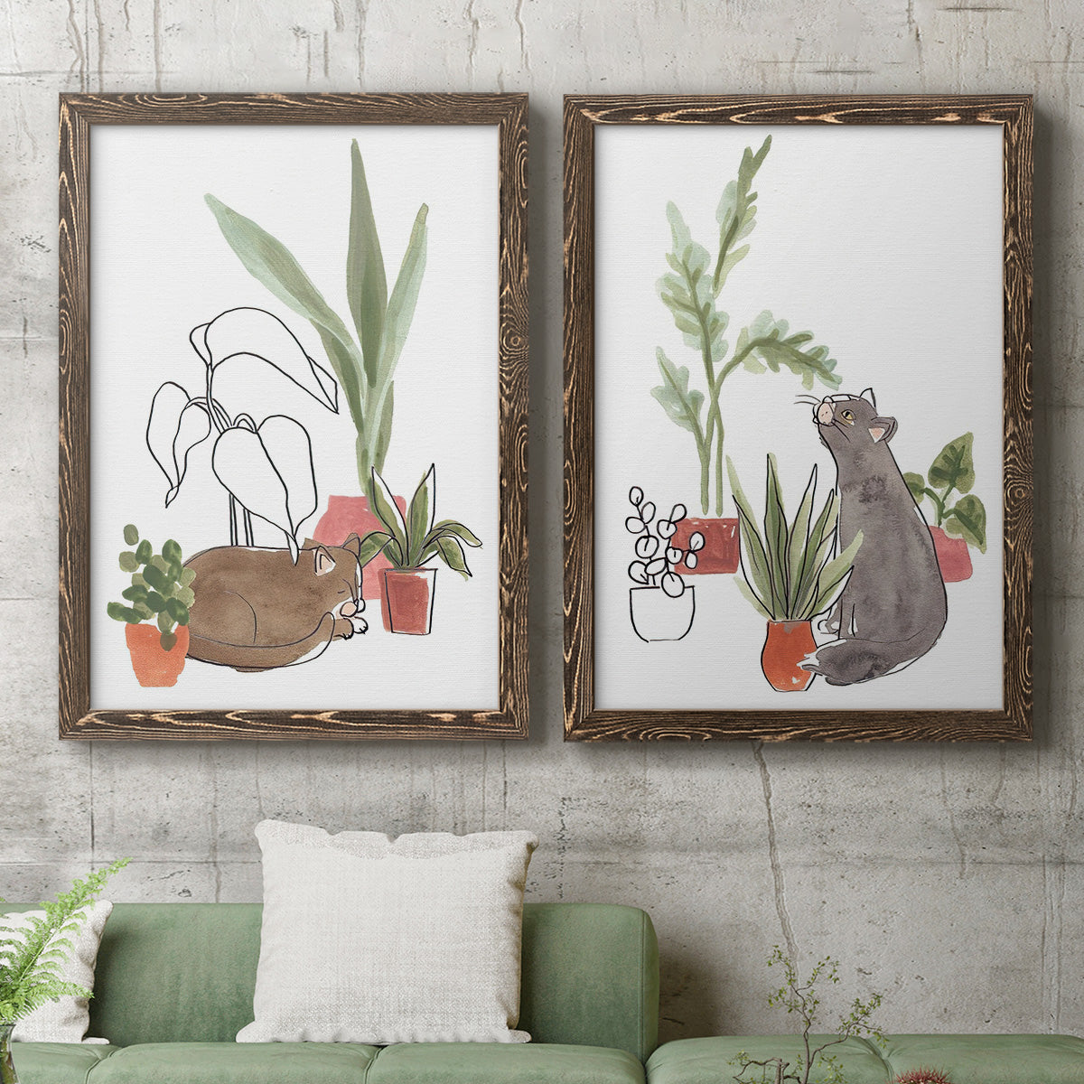 Set of two walnut barnwood framed canvas prints depicting a coordinated art pair of cats tucked among collections of potted houseplants rendered as whimsical botanical animal illustrations above a sofa in a modern living room.