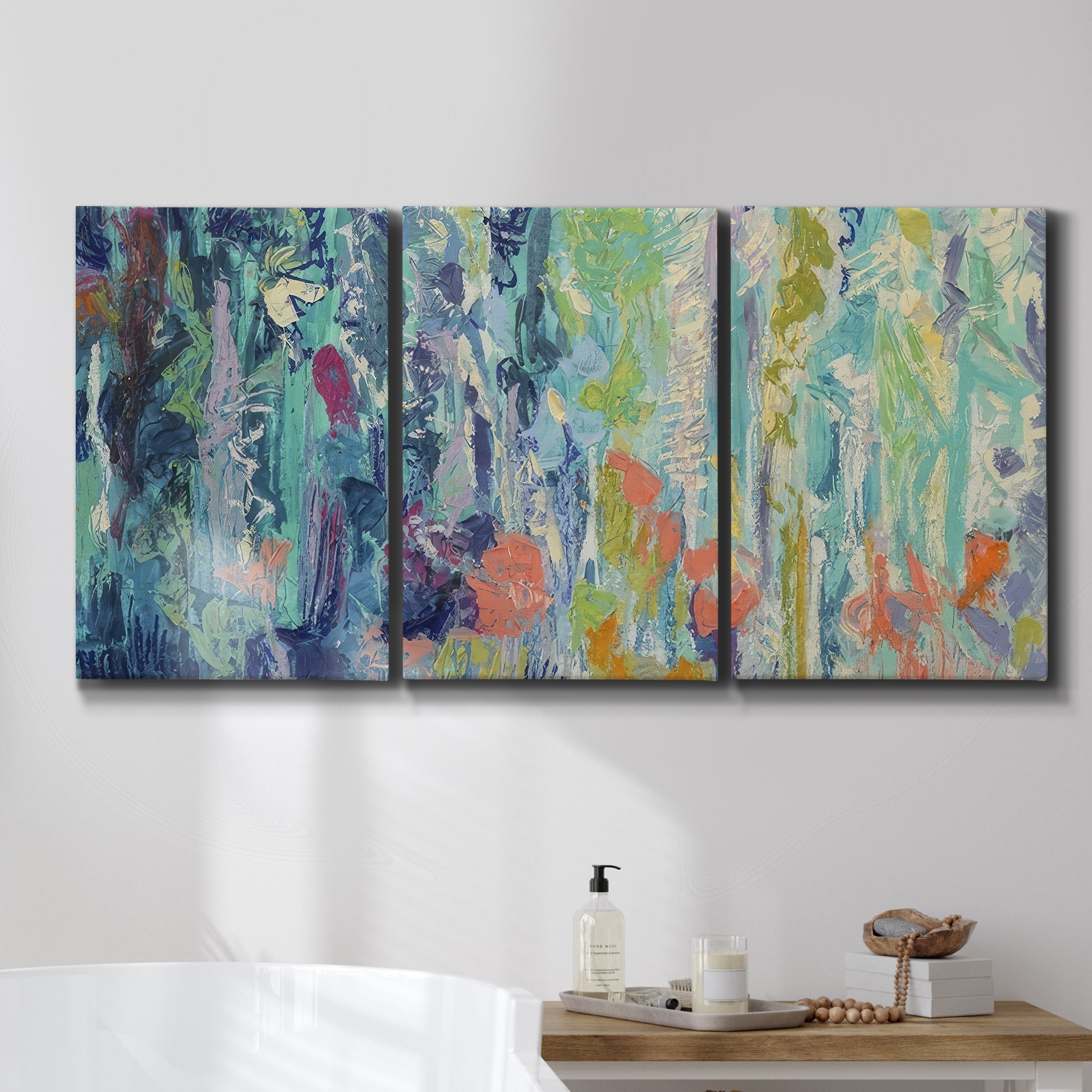 Three-panel canvas wall art featuring abstract rainfall with butterfly forms, displayed in a bathroom above a bathtub.