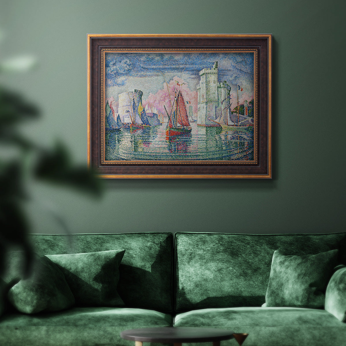 Impressionist harbor scene by Paul Signac in an ornate bronzed mahogany wood frame displayed in a dark-toned interior setting.