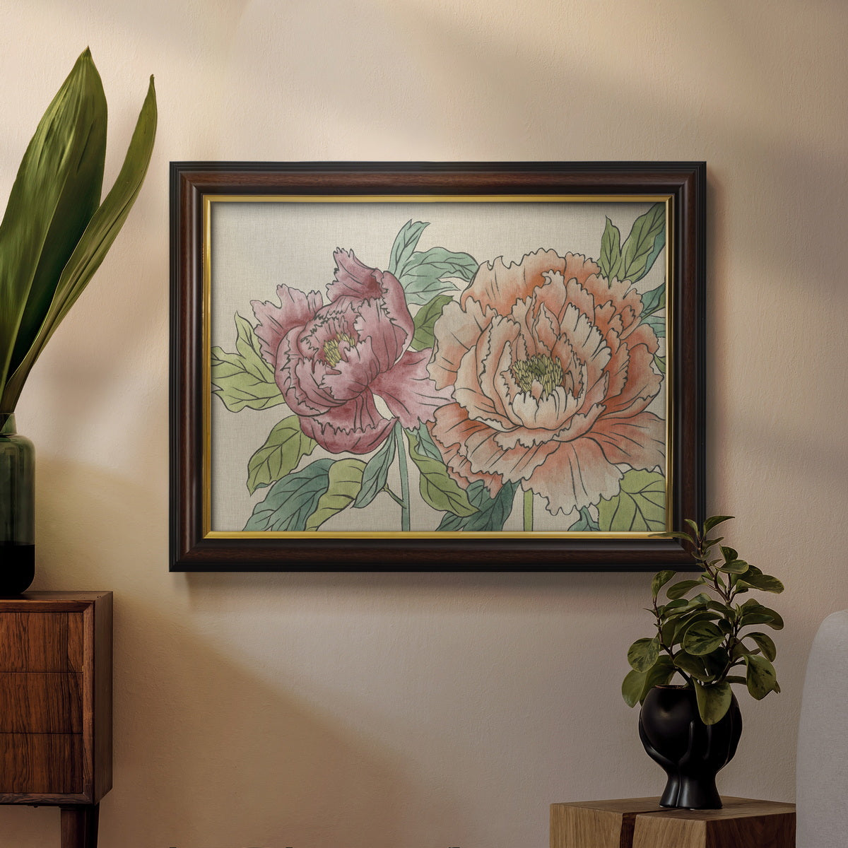 Modern peony floral drawing in an ornate mahogany wood frame with gold liner displayed in a dark-toned interior setting.
