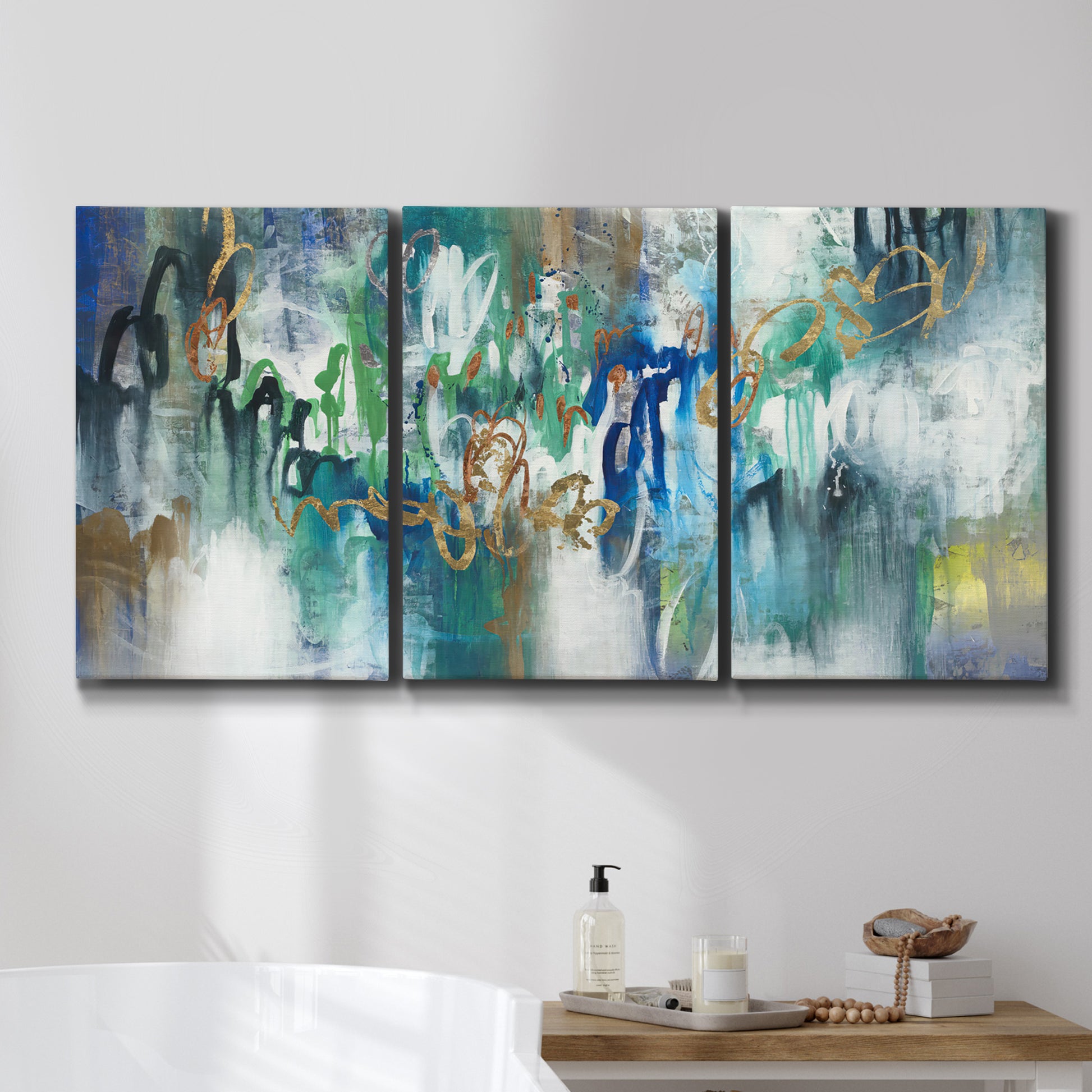 Three-panel canvas wall art featuring joyful abstract color harmony, displayed in a bathroom above a bathtub.