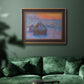 Impressionist haystack scene at sunset by Claude Monet in an ornate bronzed mahogany wood frame displayed in a dark-toned interior setting.