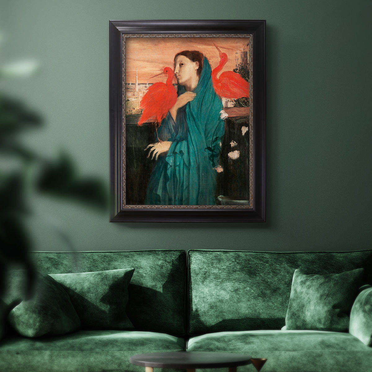 Impressionist portrait of a young woman with an ibis by Edgar Degas in an ornate black frame with gilded inner detail displayed in a dark-toned interior setting.