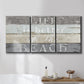 Three-panel canvas wall art featuring beach themed typography design, displayed in a bathroom above a bathtub.