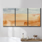 Three-panel canvas wall art featuring minimal horizon with soft blue tones, displayed in a bathroom above a bathtub.