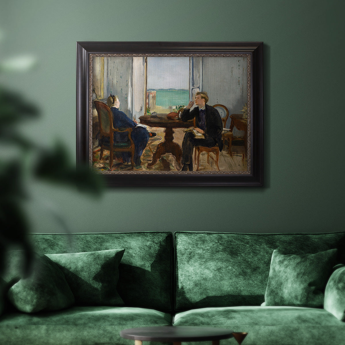 Impressionist interior scene by Édouard Manet in an ornate black frame with gilded inner detail displayed in a dark-toned interior setting.
