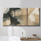 Three-panel canvas wall art featuring blurred mixed media abstract collage, displayed in a bathroom above a bathtub.