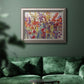 Impressionist floral bouquet artwork in an ornate vintage silver frame displayed in a dark-toned interior setting.