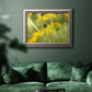 Contemporary black-eyed Susan flower photography in an ornate vintage silver frame displayed in a dark-toned interior setting.