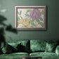 Contemporary peony flower illustration in an ornate vintage silver frame displayed in a dark-toned interior setting.