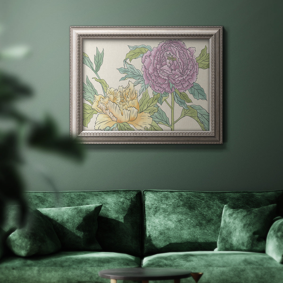 Contemporary peony flower illustration in an ornate vintage silver frame displayed in a dark-toned interior setting.