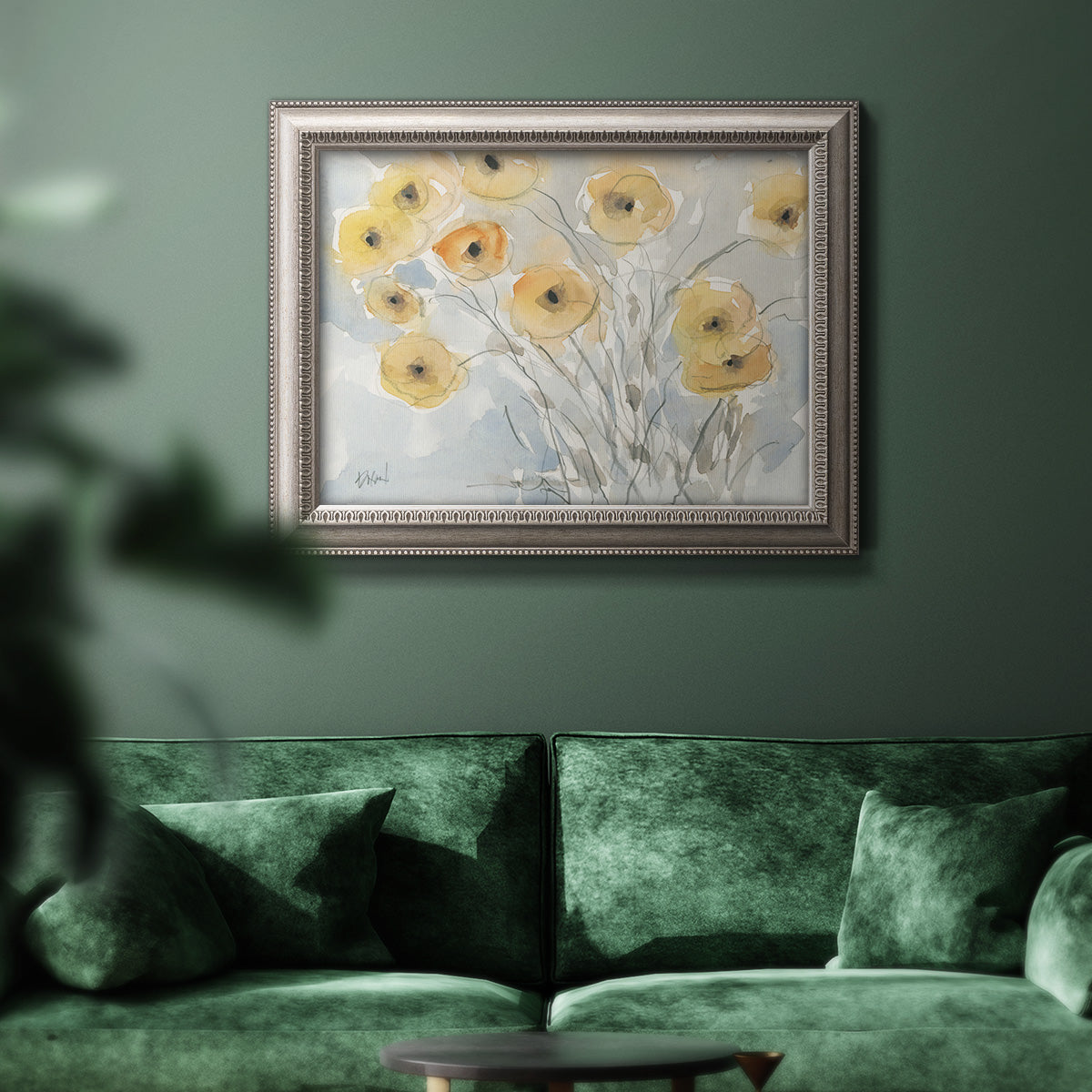 Impressionist poppy floral watercolor painting in an ornate vintage silver frame displayed in a dark-toned interior setting.