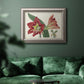 Antique amaryllis botanical flower illustration in an ornate vintage silver frame displayed in a dark-toned interior setting.