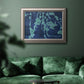 Industrial abstract botanical in an ornate vintage silver frame displayed in a dark-toned interior setting.