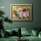 Echinacea flower botanical photography in an ornate vintage silver frame displayed in a dark-toned interior setting.