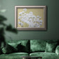 Minimal floral baby’s breath photography in an ornate vintage silver frame displayed in a dark-toned interior setting.