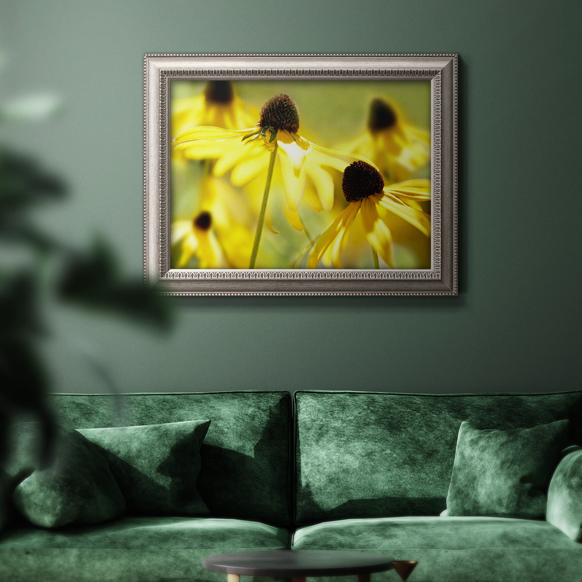 Modern floral Susan flower photography in an ornate vintage silver frame displayed in a dark-toned interior setting.