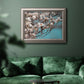 Color-rich dogwood floral photography in an ornate vintage silver frame displayed in a dark-toned interior setting.