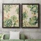 Set of two black barnwood framed canvas prints depicting a coordinated art pair of dense repeating succulents and small flowers rendered as decorative botanical pattern prints above a sofa in a modern living room.