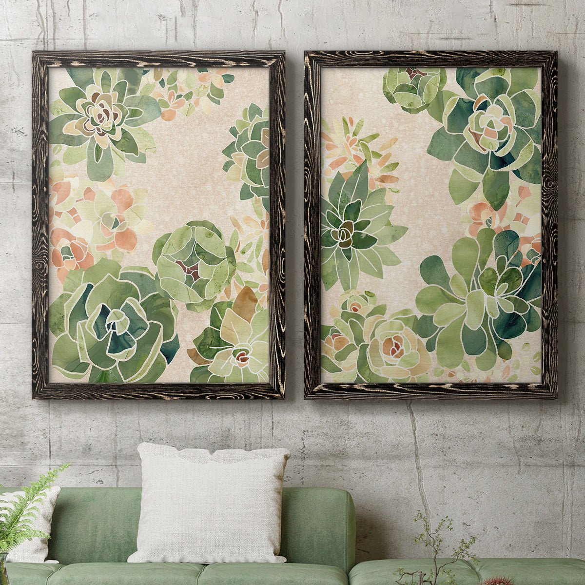 Set of two black barnwood framed canvas prints depicting a coordinated art pair of dense repeating succulents and small flowers rendered as decorative botanical pattern prints above a sofa in a modern living room.