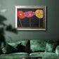 Contemporary poppy flower artwork in an ornate mottled silver frame displayed in a dark-toned interior setting.