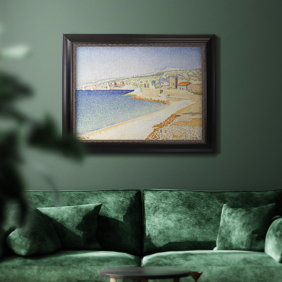 Impressionist Mediterranean jetty seascape by Paul Signac in an ornate black frame with gilded inner detail displayed in a dark-toned interior setting.