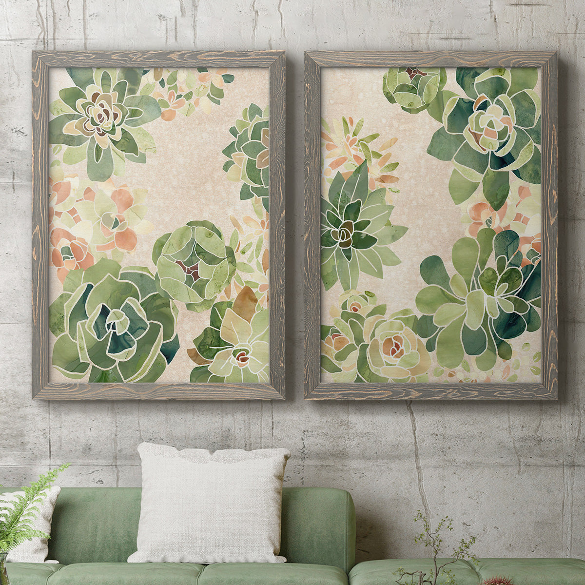 Set of two gray barnwood framed canvas prints depicting a coordinated art pair of dense repeating succulents and small flowers rendered as decorative botanical pattern prints above a sofa in a modern living room.