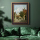 Rustic European street scene painting by Adriaan Eversen in an ornate bronzed mahogany wood frame displayed in a dark-toned interior setting.