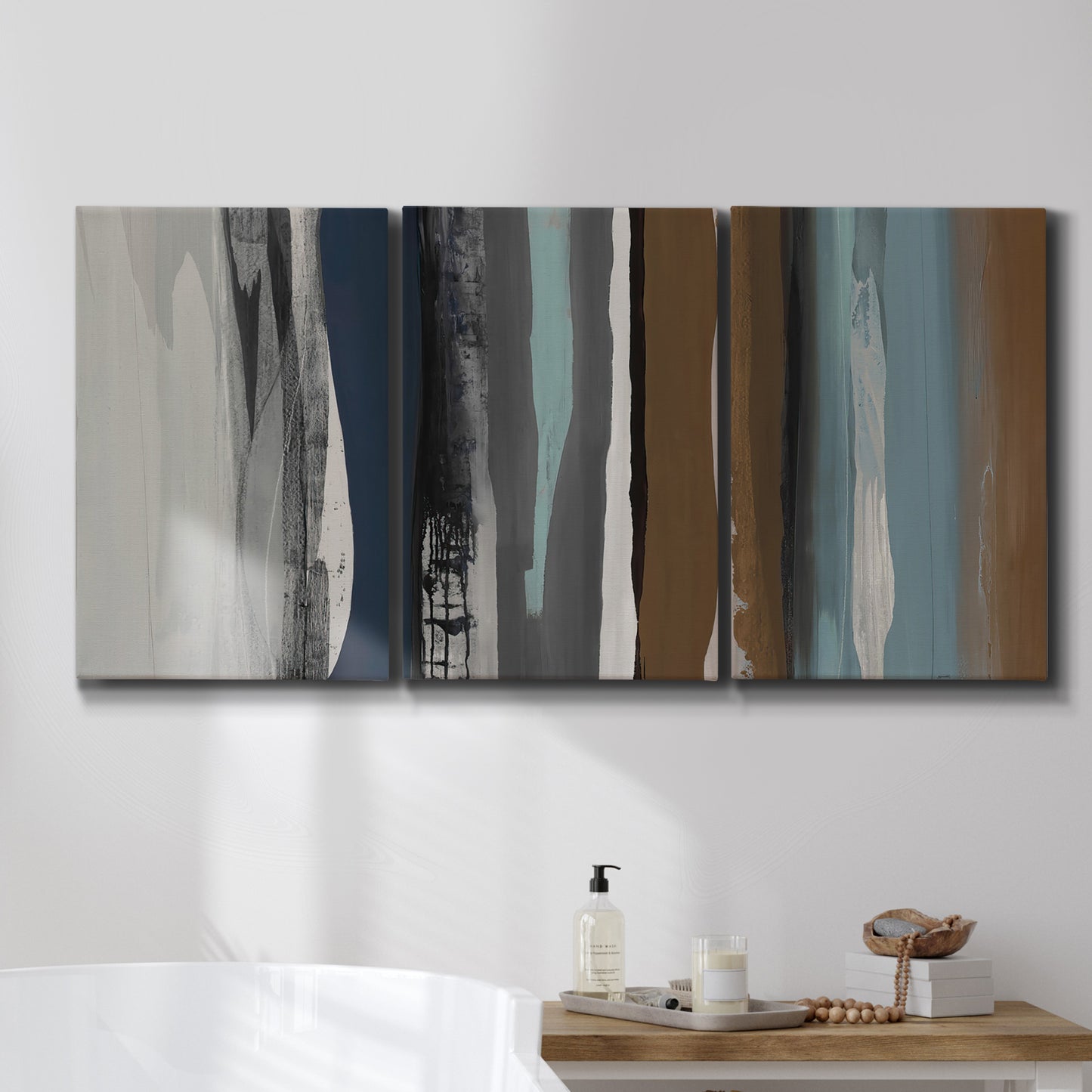 Three-panel canvas wall art featuring layered abstract amusement park tones, displayed in a bathroom above a bathtub.