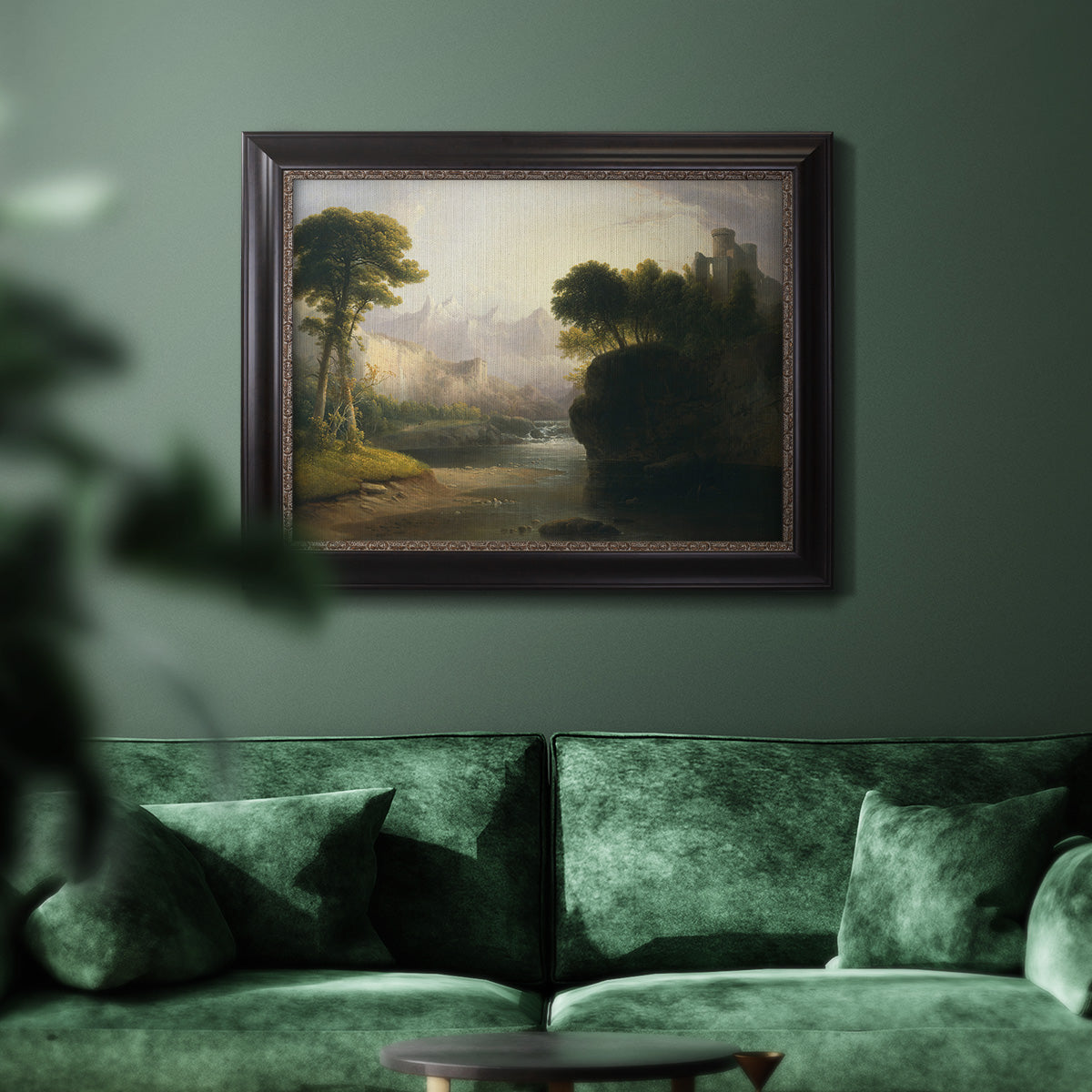 Romantic autumn landscape along the Hudson River by Thomas Doughty in an ornate black frame with gilded inner detail displayed in a dark-toned interior setting.