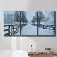 Three-panel canvas wall art featuring snow covered rural road photograph, displayed in a bathroom above a bathtub.