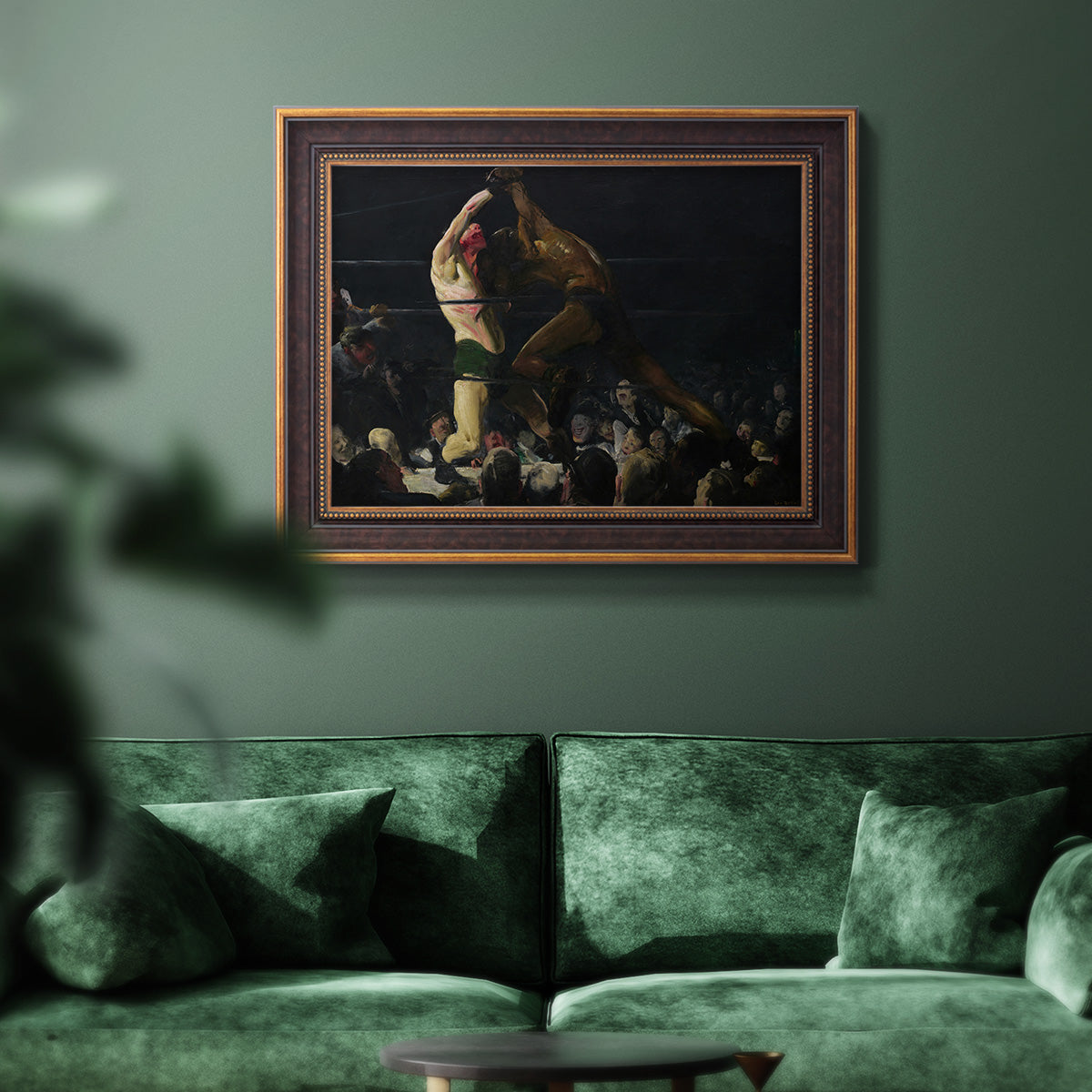 American genre painting of men in a social club by George Bellows in an ornate bronzed mahogany wood frame displayed in a dark-toned interior setting.
