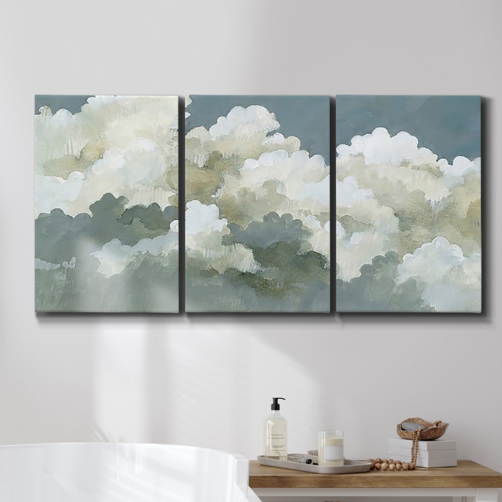 Three-panel canvas wall art featuring abstract evening landscape with depth, displayed in a bathroom above a bathtub.