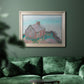 Impressionist coastal building landscape by Claude Monet in an ornate champagne frame displayed in a dark-toned interior setting.