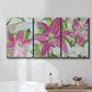 Three-panel canvas wall art featuring pink and white lilies in bloom, displayed in a bathroom above a bathtub.
