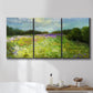 Three-panel canvas wall art featuring pastoral field with wildflowers, displayed in a bathroom above a bathtub.